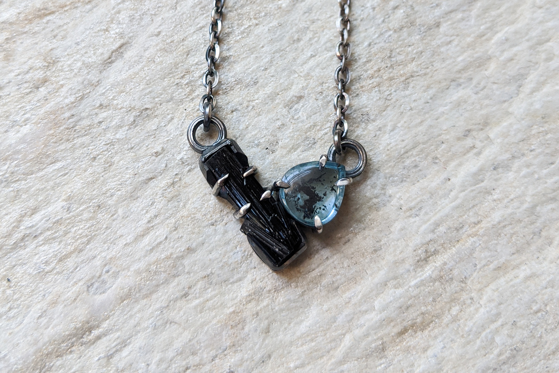 aqua and black tourm close up necklace