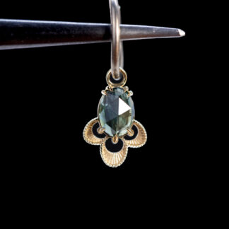 The Violet Charm Blue-Green Sapphire 10.2mm x 8mm