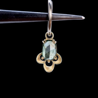 The Violet Charm Blue-Green Sapphire 10.3mm x 7.9mm