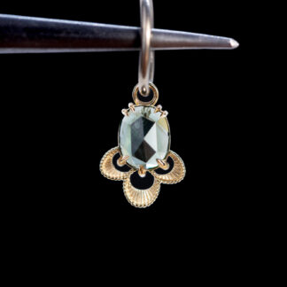 The Violet Charm Blue-Green Sapphire 10.6mm x 8.7mm