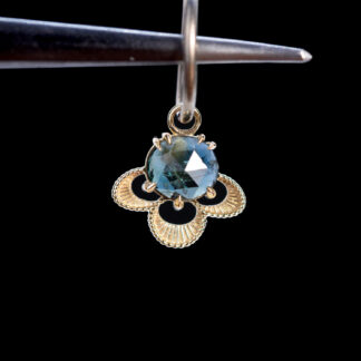 The Violet Charm Blue-Green Sapphire 9.2mm x 10.6mm