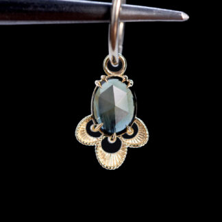 The Violet Charm Blue-Green Sapphire